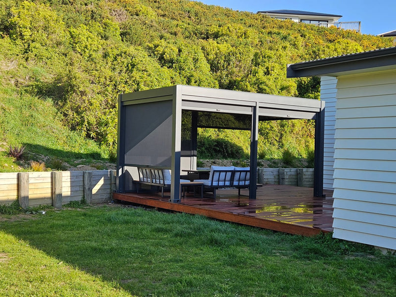 Pergola on a Windy Hillside Deck: A Cozy All-Weather Retreat