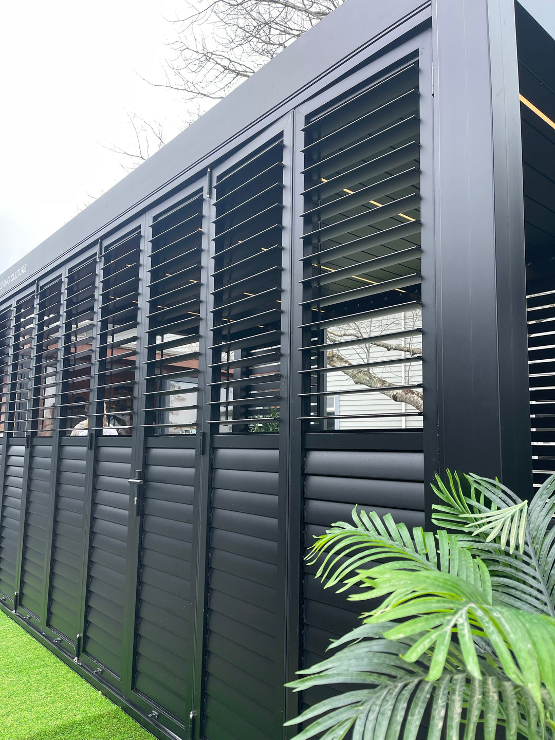 Caribbean Freestanding Pergola Bifold Shutter Wall